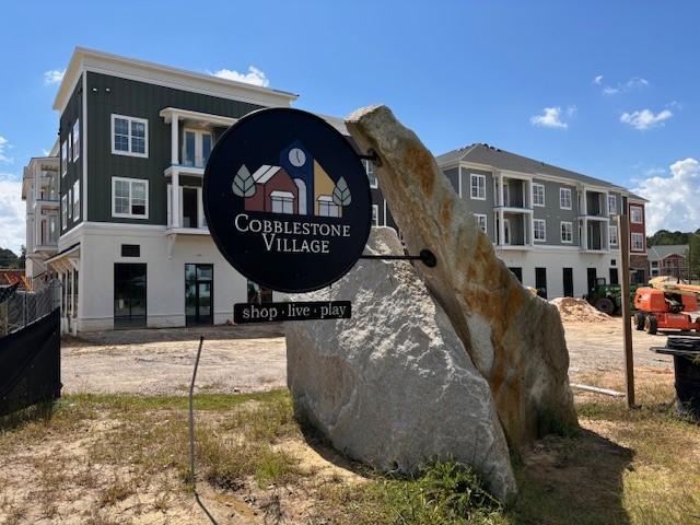 Cobblestone village Sign