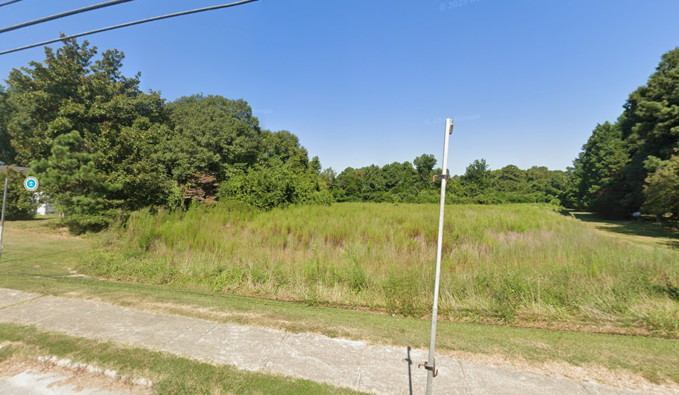 grassy field plot of land